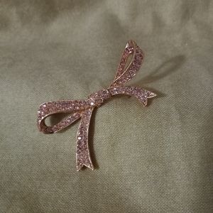 Pink stones bow tie brooch